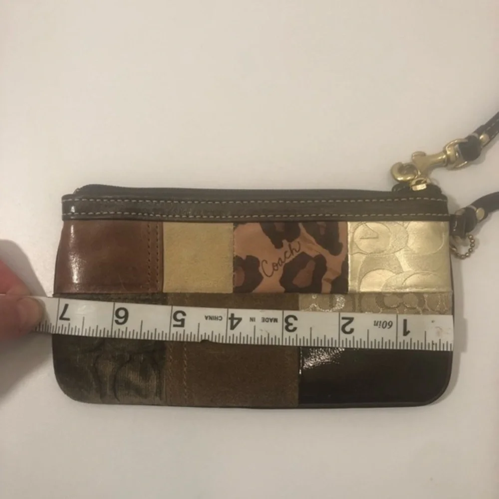 Coach brown multi texture patchwork wristlet bag